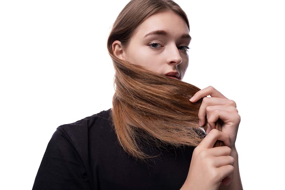 Техники для восстановления блеска и силы волос после отдыха на море