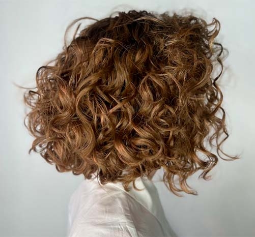 Результат вертикальной техники завивки волос