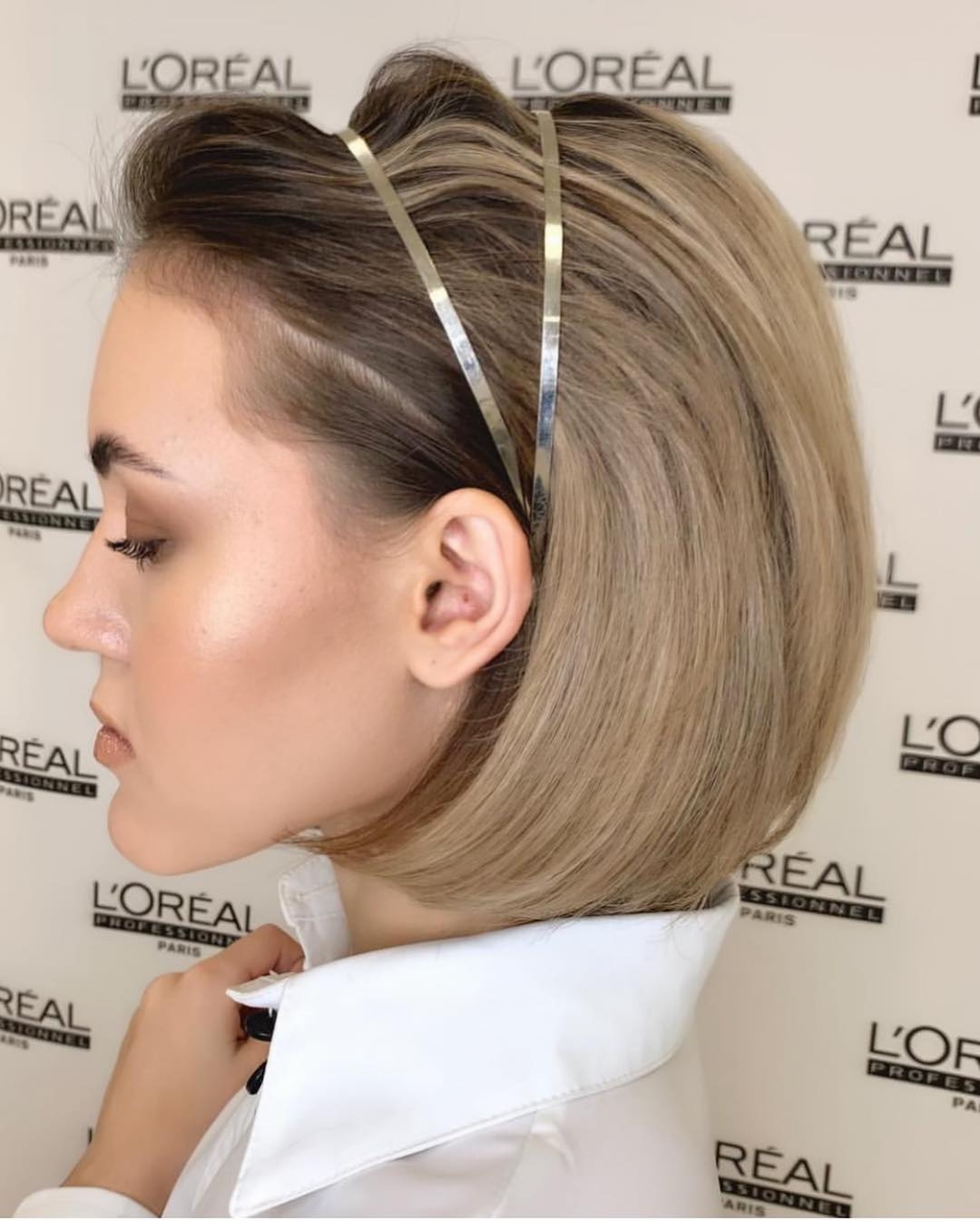 Элегантная укладка для корпоратива: объемный боб, уложенный брашингом