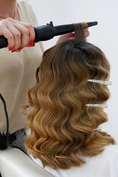 Использование плойки для завивки волос